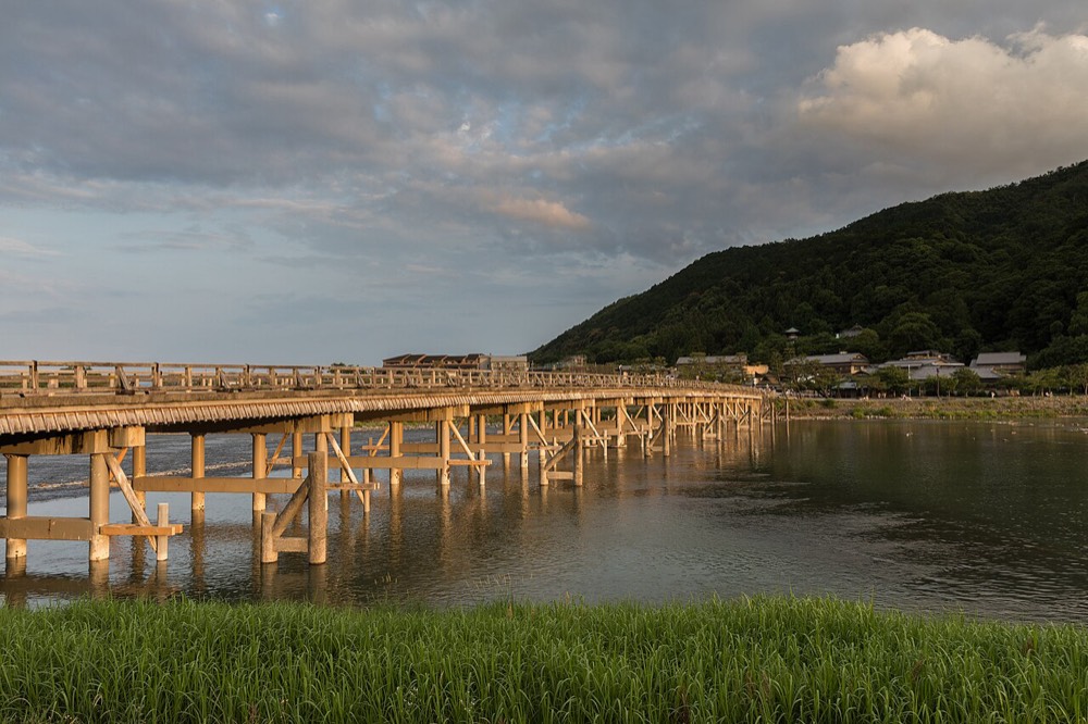Togetsukyo Bridge and the Arashiyama mountains at dusk