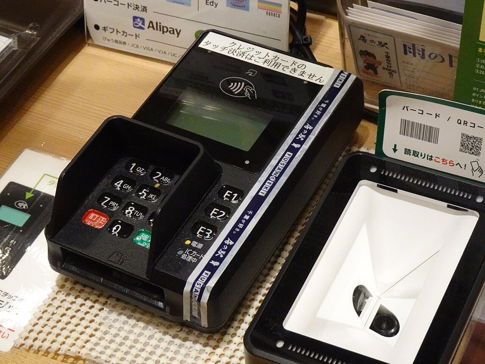 Card and contactless payment terminals at a Japanese shop