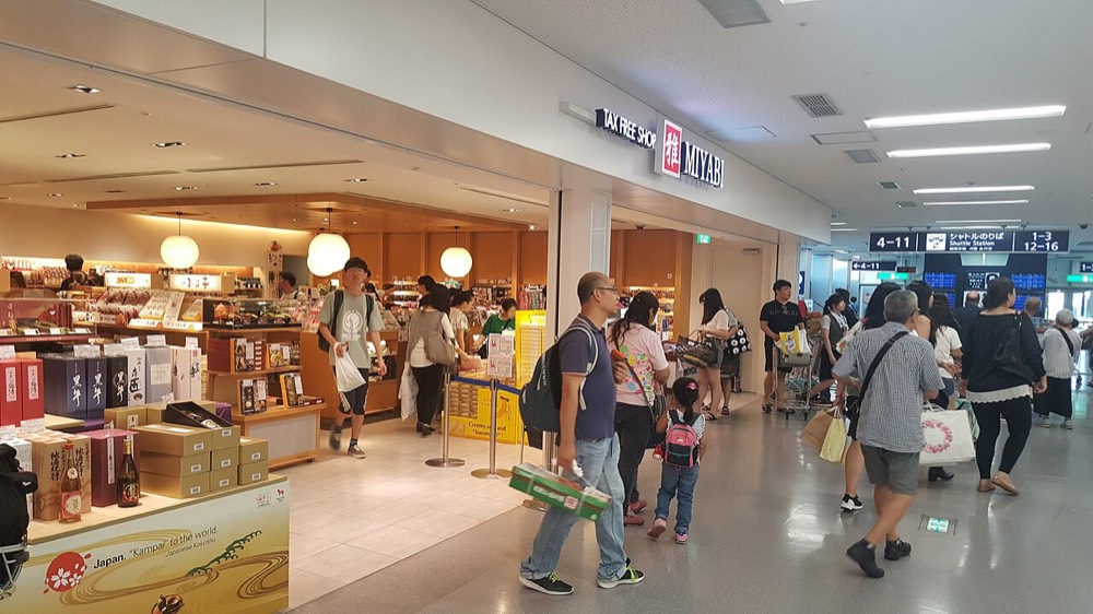 A tax-free shop storefront inside Kansai Airport terminal