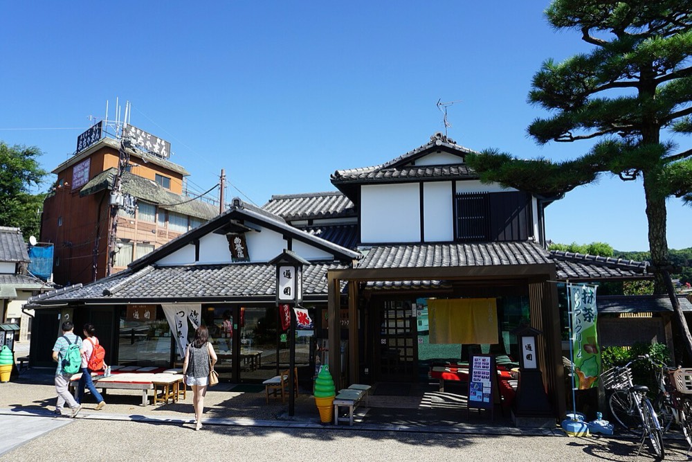 Tsuen tea house beside Uji Bridge, with a classic wooden facade