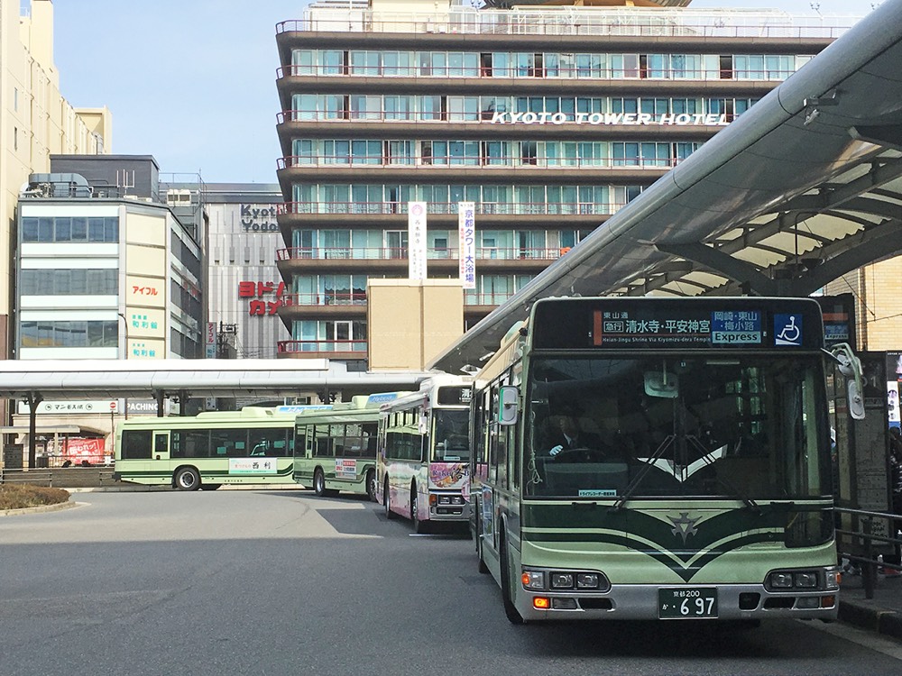 The bus terminal in front of Kyoto Station, with many buses at their boarding points