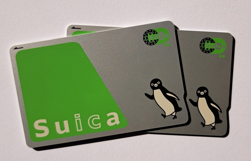 Two physical Suica cards placed side by side