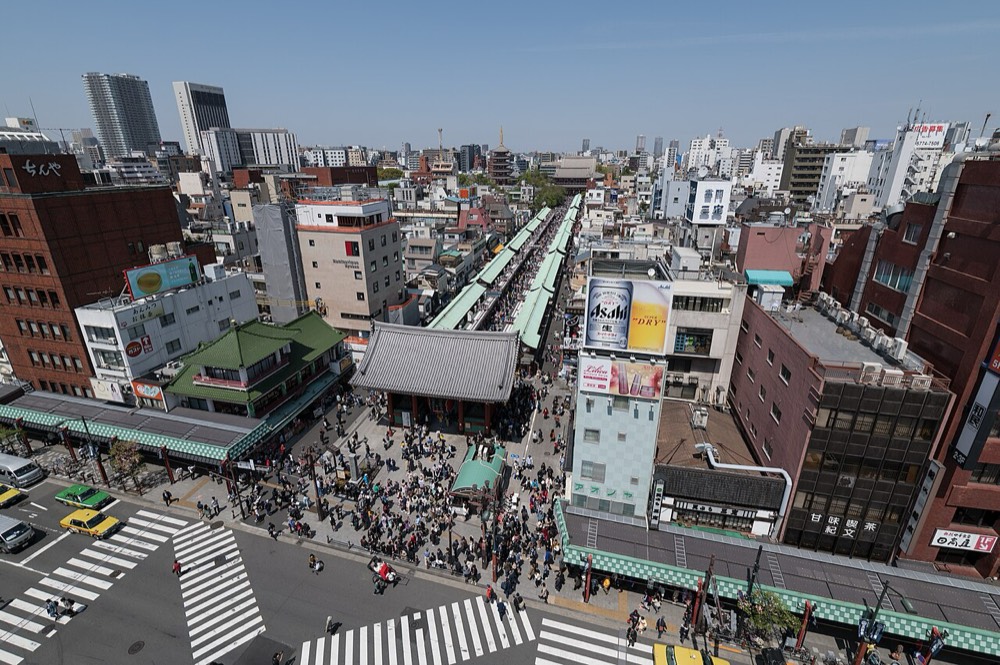 Shops lining Nakamise-dori in Asakusa, crowded with visitors